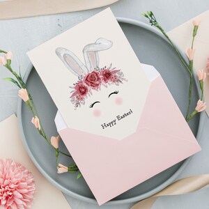 Carte de joyeuses Pâques avec lapin mignon et fleurs roses Carte de voeux de Pâques douce pour les amis et la famille Carte de Pâques bohème moderne
