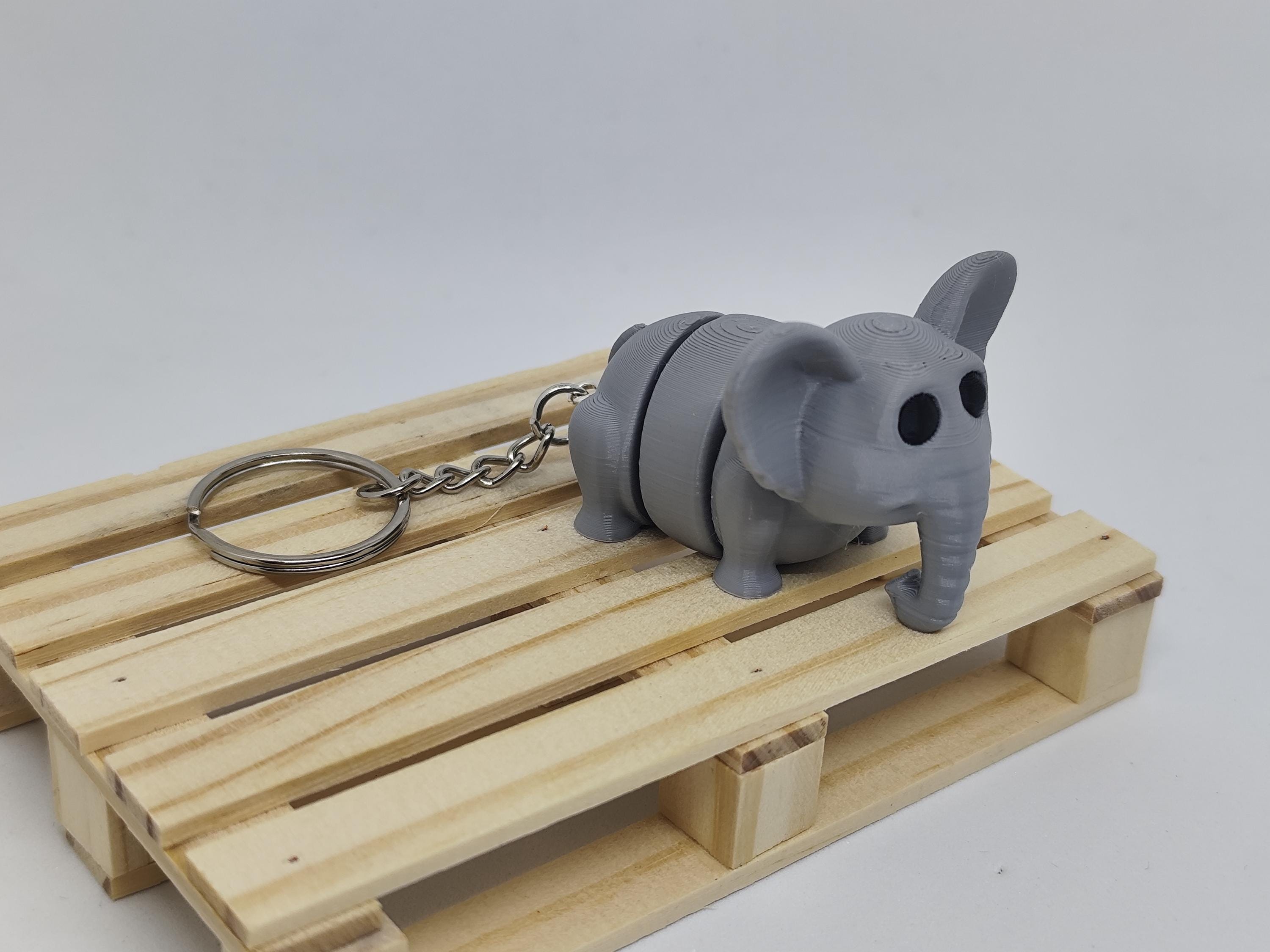 Articulated Elephant Keychain: Whimsical Bendable Figurine, Animal Lover Gift