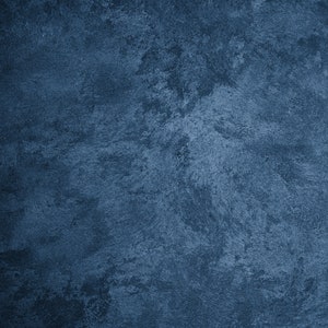 May include: A textured blue background with a rough, uneven surface. The background is a solid color with no patterns or designs.