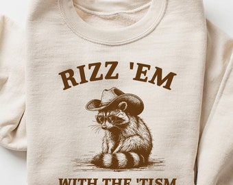Rizz Em With The Tism Retro Sweatshirt, Vintage Funny Raccoon Graphic Shirt, Autism Awareness, Raccoon Meme Shirt, cute Raccoon shirt