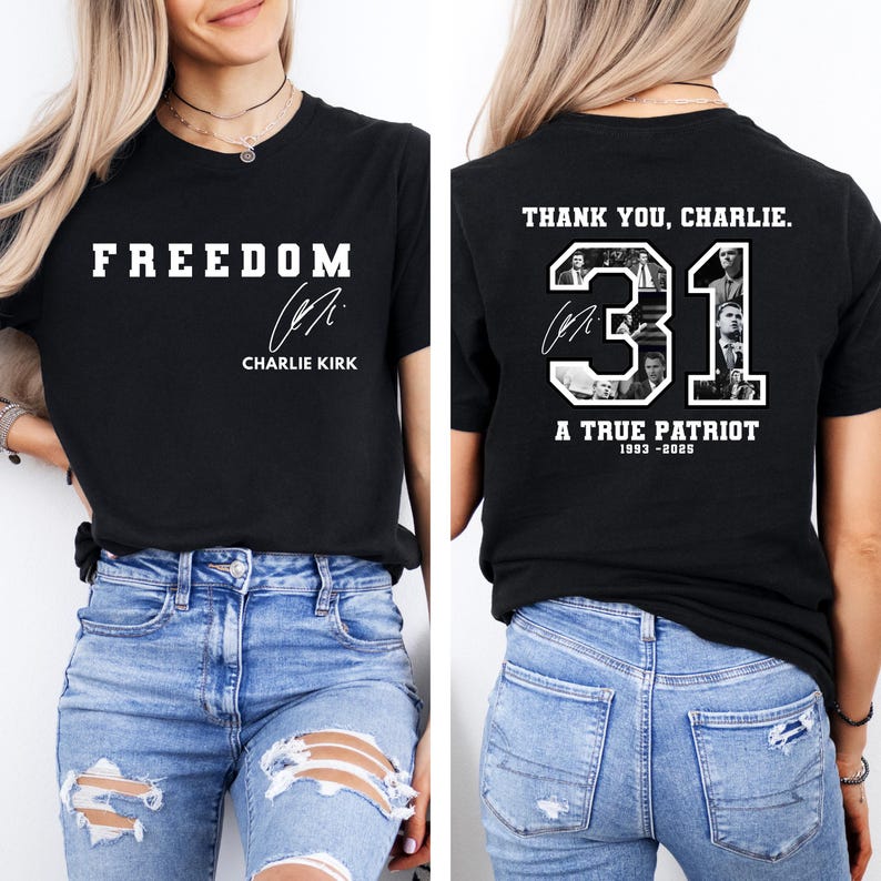 May include: Black t-shirt with the word "FREEDOM" in white block letters. The front of the shirt also features the signature of Charlie Kirk. The back of the shirt says "THANK YOU, CHARLIE. 31 A TRUE PATRIOT 1993-2025" with images.