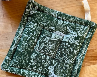 Beautiful Rabbit potholder, Dark green and blue trivet with leaping rabbits and flowers, Rifle Paper Company