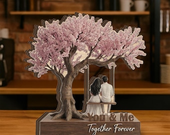 Spersonalizowany drewniany blok z motywem kwitnącej wiśni: para na huśtawce, niestandardowe imiona