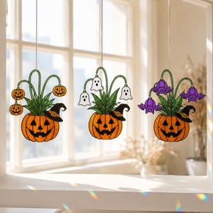 Décoration végétale holographique d'Halloween à suspendre à la fenêtre : citrouille fantôme ou chauve-souris. Décoration intérieure.
