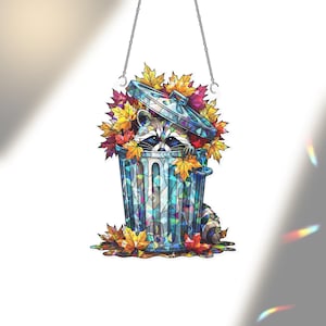 Raccoon in Trash Can Autumn Window Hanging – Cute Fall Suncatcher, Holographic Raccoon Decor, Whimsical Woodland Animal Art