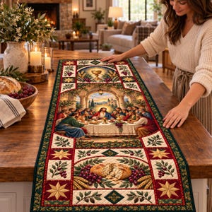 May include: A rectangular table runner featuring a central scene of the Last Supper with Jesus and the disciples. The design includes borders with gold stars, green leaves, red grapes, and a chalice motif, all set against a dark green background.