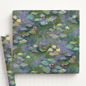 May include: A square canvas and a rolled-up tube of wrapping paper feature a water lily pond painting. The artwork depicts lily pads, water, and flowers in shades of green, purple, yellow, and pink. The style is reminiscent of impressionist art.