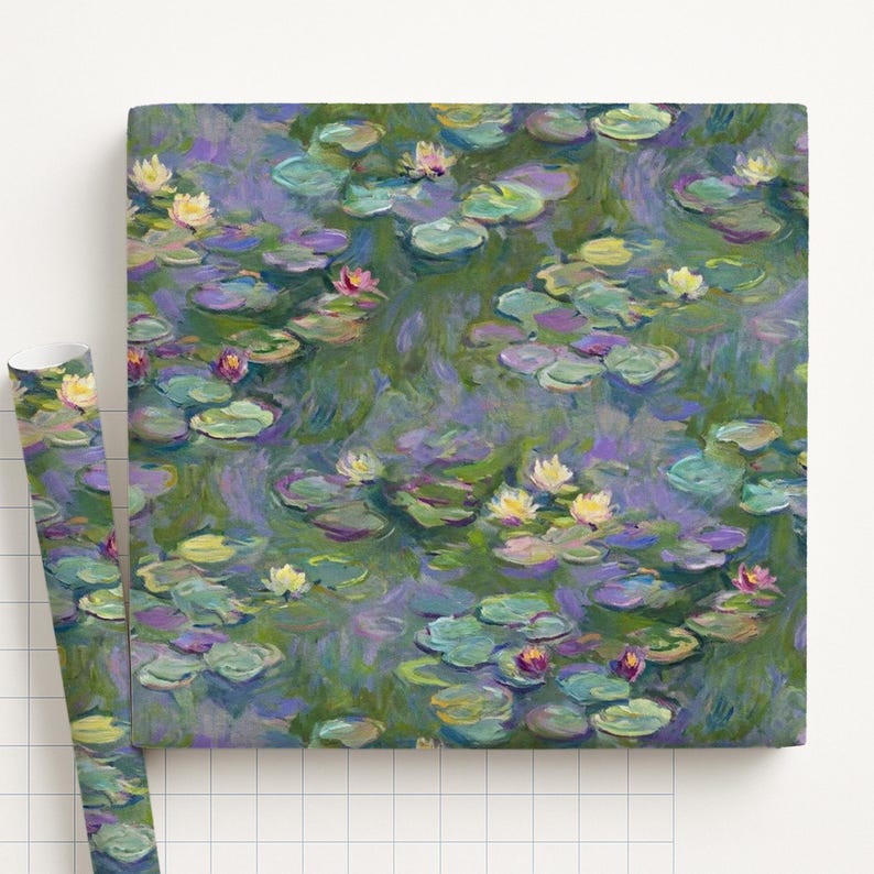 May include: A square canvas and a rolled-up tube of wrapping paper feature a water lily pond painting. The artwork depicts lily pads, water, and flowers in shades of green, purple, yellow, and pink. The style is reminiscent of impressionist art.
