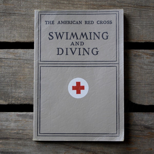 vintage red cross swimming and diving book