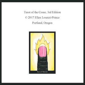 May include: Ace of Wands tarot card from the Tarot of the Crone deck. The card features a black finger with a pink nail, with a yellow flame above it. The card is set against a yellow background.