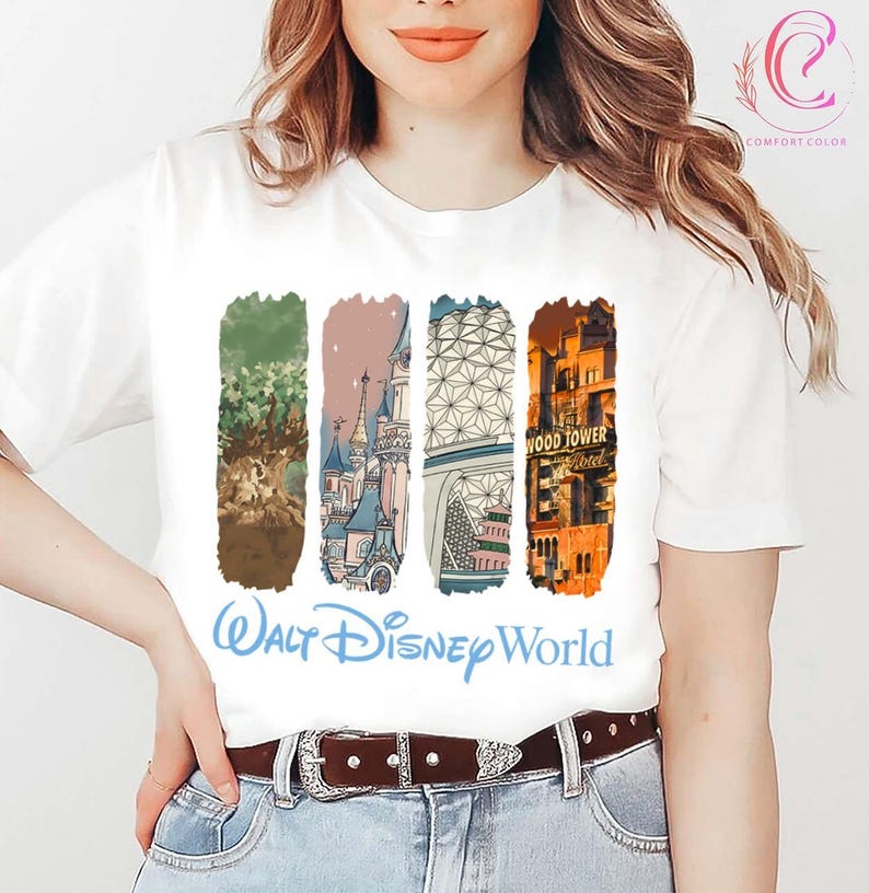 May include: White t-shirt featuring four vertical rectangular designs with illustrations of Walt Disney World landmarks. The shirt includes the text "Walt Disney World" in a light blue script font.