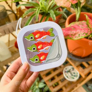 Portagioie con design a forma di salmone, contenitore portatile da viaggio per gioielli, dadi, cerotti, medicine, pillole, articoli da toeletta, cancelleria, simpatico regalo a forma di pesce in scatola.