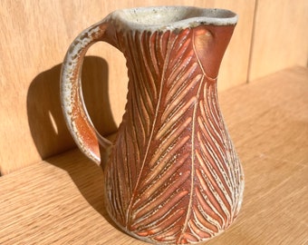 Carved Small Pitcher