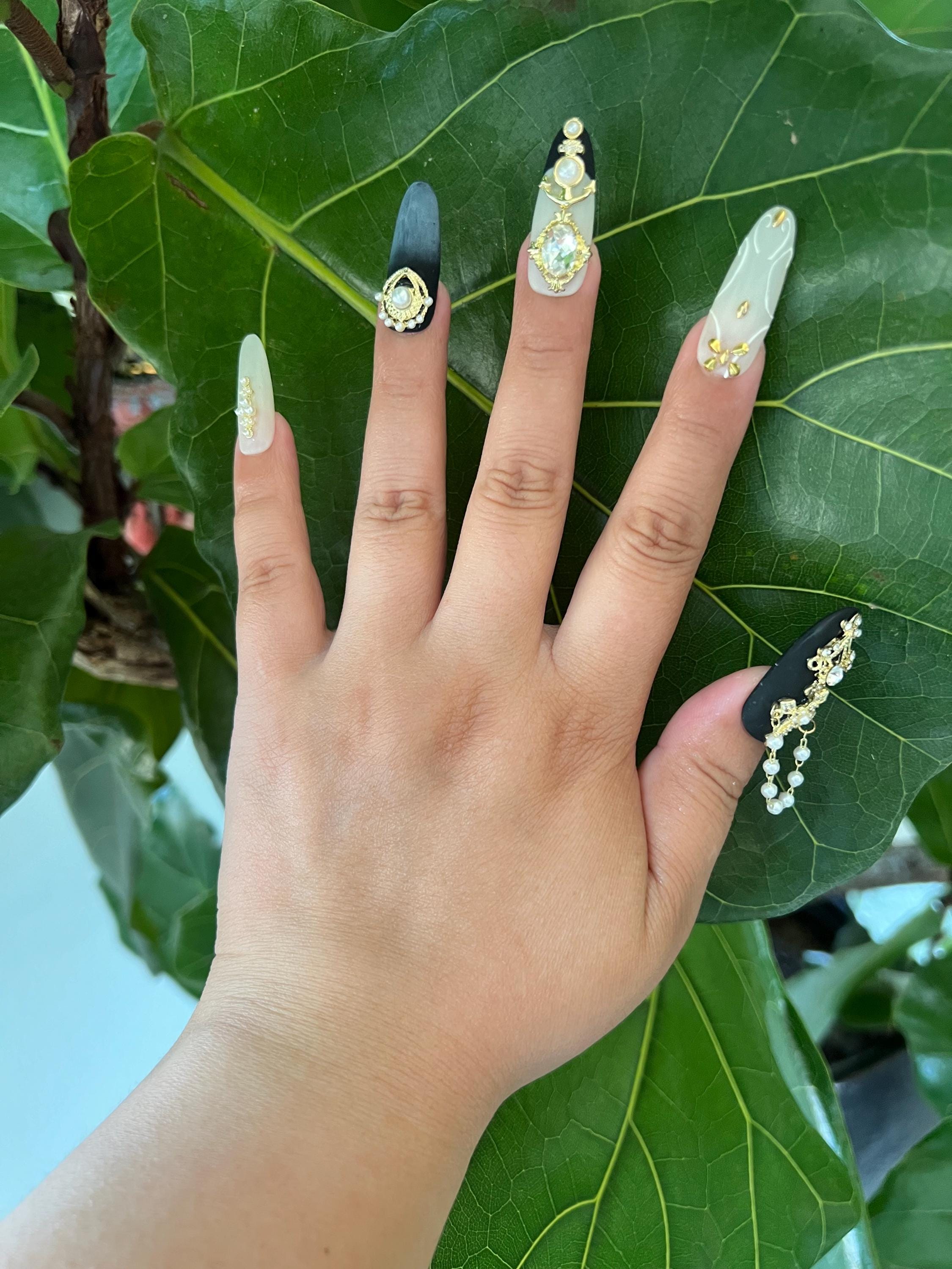 Elegant Almond Nails with Crystal Flair