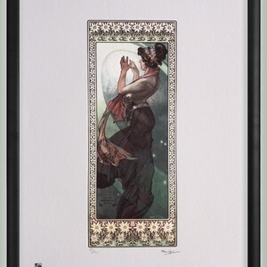 May include: Art Nouveau print in a black frame. The artwork shows a woman in a flowing gown, with a floral border. The colour palette includes greens, reds, and browns. The woman is reaching towards a large, glowing orb. The print is signed.