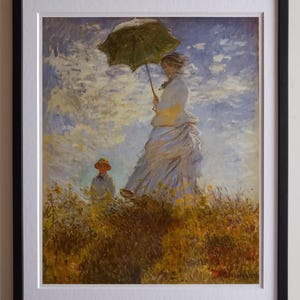 Claude Monet – Der Spaziergang. Frau mit Sonnenschirm - gerahmt