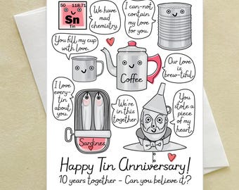 May include: A white card with illustrations for a tin anniversary. The card features a periodic table element, a coffee pot, a tin can, sardines, and a wizard. Text includes "Happy Tin Anniversary!" and "10 years together - Can you believe it?"