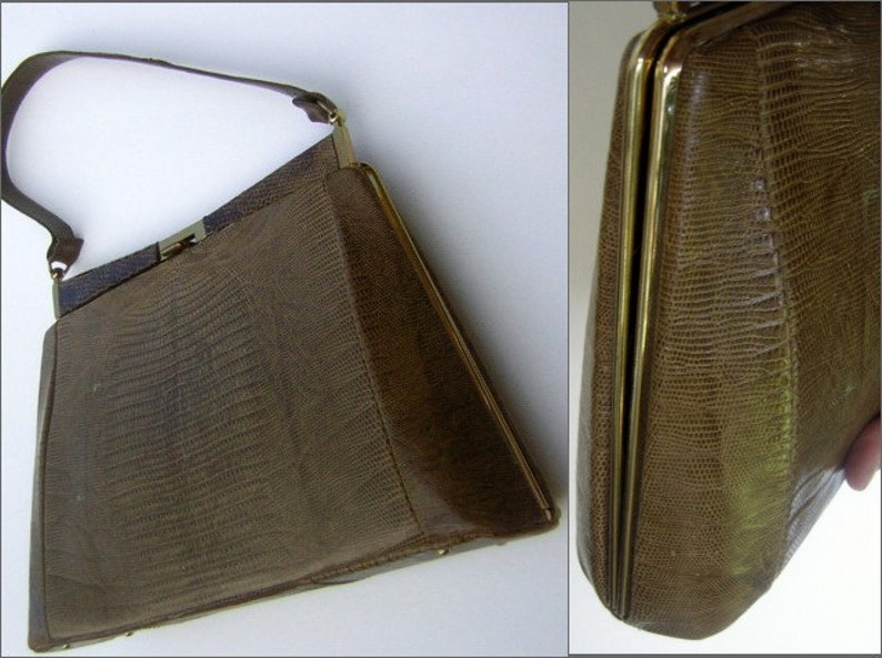 May include: A brown leather handbag with a gold clasp and a gold chain strap. The bag has a textured, embossed pattern.