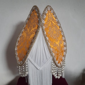 Victorian handcrafted lampshade with golden trim and orange fabric