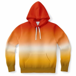 Puede incluir: Una sudadera con capucha con un diseño degradado. La parte superior de la capucha es roja, pasando a naranja, luego a blanco y finalmente a amarillo en la parte inferior. Tiene un bolsillo delantero y cordones blancos.