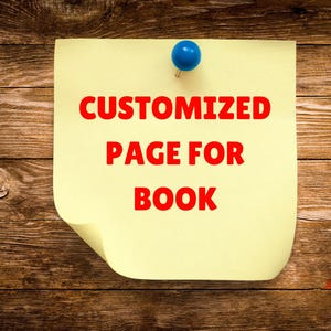 May include: A yellow sticky note with the words "CUSTOMIZED PAGE FOR BOOK" in red, pinned to a wooden surface with a blue push pin. The wood grain is visible.