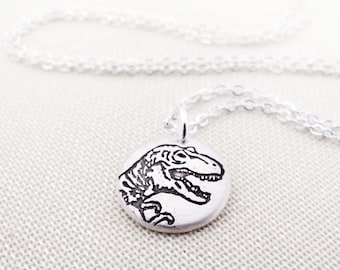 Tiny T Rex necklace in silver, Tyrannosaurus Rex jewelry, gift for dinosaur lover