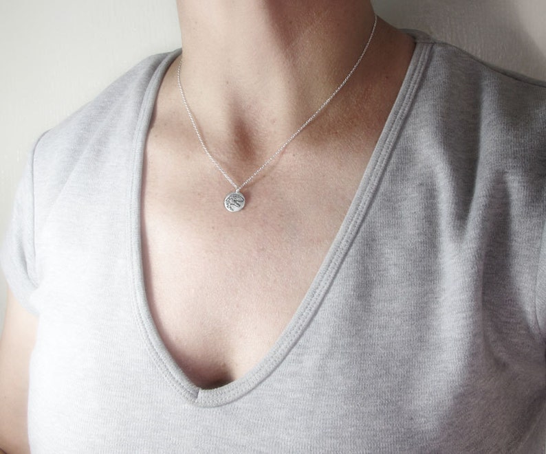 Tiny bat necklace in silver