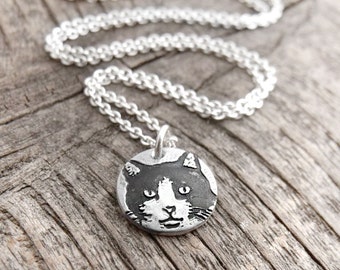 Tiny cat necklace in silver, pet remembrance jewelry, black and white tuxedo cat