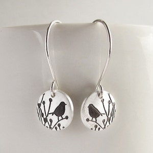 Tiny little bird earrings in silver