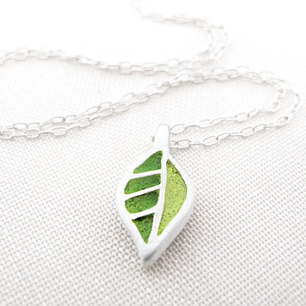 Tiny green leaf necklace in concrete and sterling silver