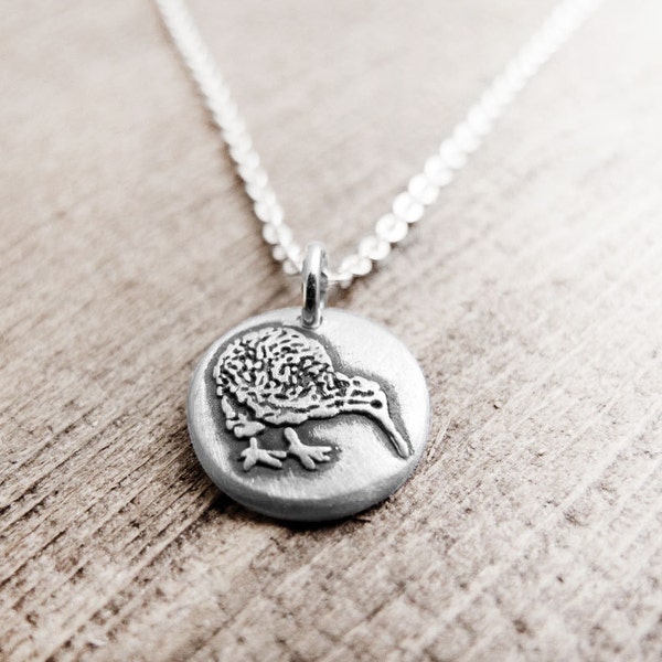 Tiny kiwi bird necklace in silver, New Zealand