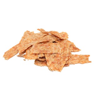 May include: A pile of thin, crispy, light brown fish skin snacks.