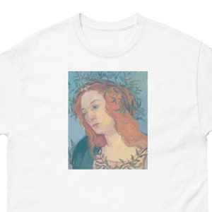 A white cotton tshirt with a portrait painting of the goddess minerva. Art on a shirt for men or woman. The portrait art is centered on the tshirt, a neoclassical style painting.