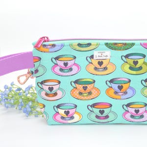 Wristlet Zipper Clutch pouch and coin purse from Curiouser Fabric by Tula Pink- Tea-time in Wonder- , Key Chain, Handmade, Gift, Zipper Bag,