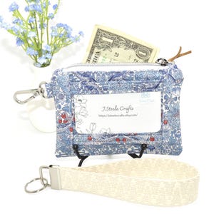 Estuche para identificación con cremallera, llavero/cadena con correa de muñeca, fabricado con tela Liberty of London, ranura transparente para identificación, monedero/minicartera