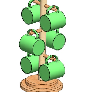 Puede incluir: Un árbol de madera para tazas con seis tazas verdes colgadas. El árbol tiene una base redonda y está hecho de madera natural.