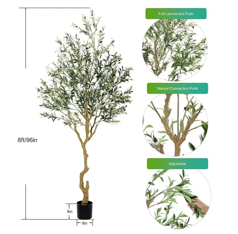 May include: A 8ft tall artificial olive tree with green leaves and black olives. The tree is in a black pot and has a brown trunk. The tree is shown with close-up details of the leaves, fruit, and trunk.