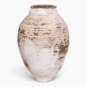 May include: A large, bulbous terracotta vessel with a tapered base and a wide, open neck. The exterior features a distressed, weathered white finish over a dark brown clay body, with horizontal ridges and visible texture throughout the surface.