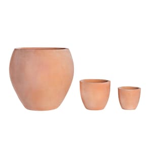 May include: Three terracotta-colored ceramic pots of varying sizes. The largest pot has a rounded shape, while the other two are smaller and cylindrical. The pots are unglazed and have a natural, earthy appearance, suitable for plants.