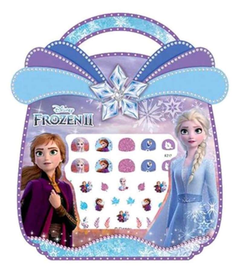 May include: A purple and blue carrying case with a snowflake design and the words "Disney Frozen II" on the front. The case contains a set of nail stickers featuring characters from the movie Frozen II, including Elsa and Anna.