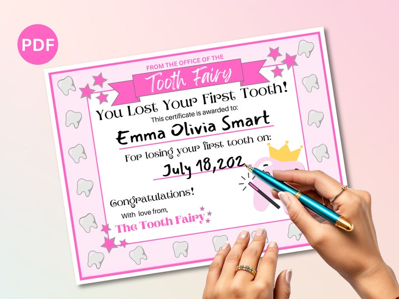 May include: A pink and white certificate with a tooth fairy theme. It says "You Lost Your First Tooth!" and is addressed to "Emma Olivia Smart" for losing her first tooth on "July 18, 202".