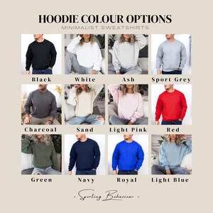 May include: A chart displaying 12 different colour options for hoodies. The colours are black, white, ash, sport grey, charcoal, sand, light pink, red, green, navy, royal, and light blue.