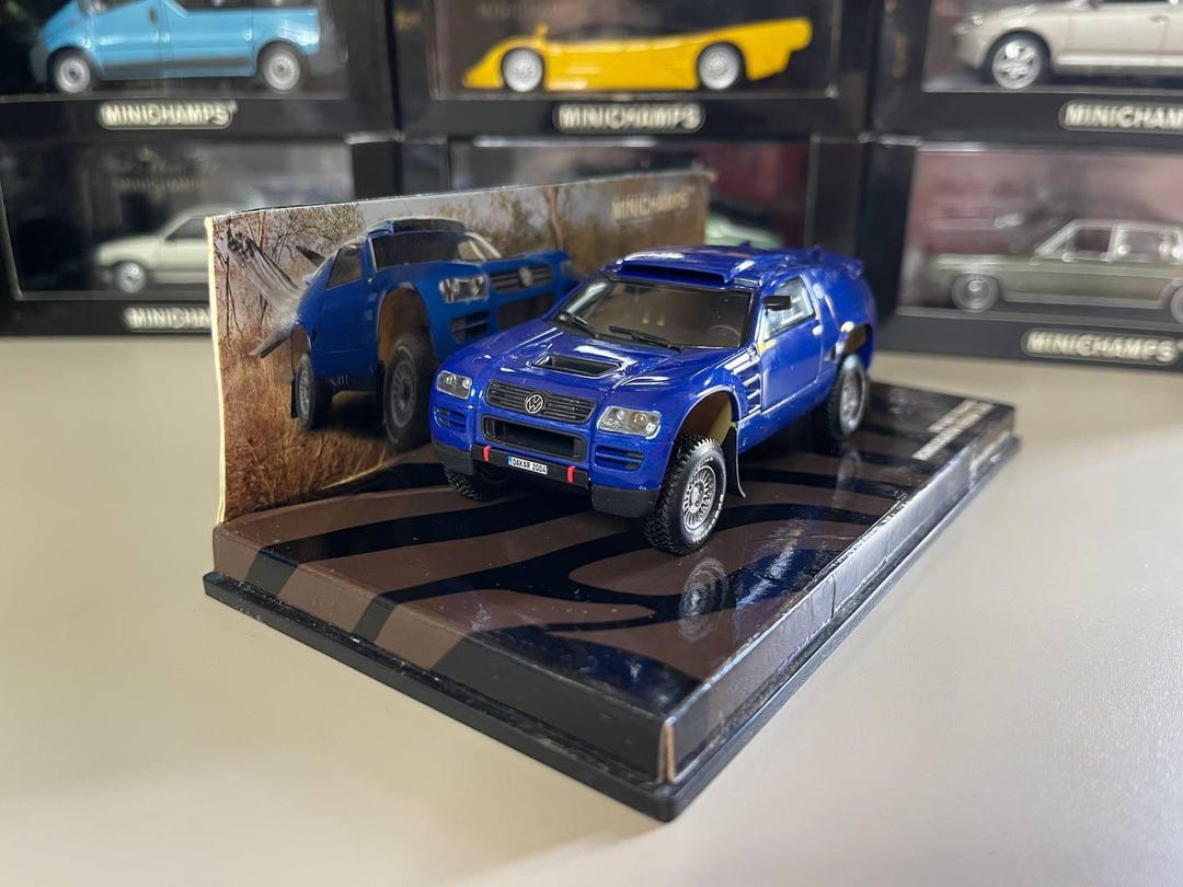 Coche miniatura Volkswagen Touareg 1/43 Herpa gris 2015 - Coches-miniaturas.es