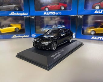 Miniatura negra Solido del BMW M3 G80 a escala 1:43