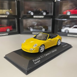 Porsche 911 Carrera S Cabriolet 1:43 Minichamps geel
