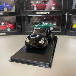 Porsche 911 Carrera 4 1:43 Minichamps Black