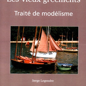 Puede incluir: Una portada de libro con el título "Les vieux gréements Traité de modélisme" de Serge Legendre y J2P Editions. La portada presenta una fotografía de varios veleros en una masa de agua.