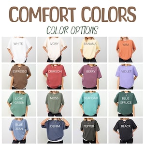 May include: A grid of t-shirts in various colors, including white, ivory, banana, yam, espresso, crimson, berry, violet, light green, moss, seafoam, blue spruce, blue jean, denim, pepper, and black. The text "COMFORT COLORS COLOR OPTIONS" is at the top.