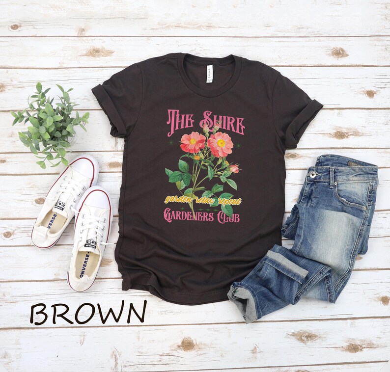 a t - shirt with a picture of a flower on it