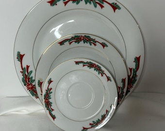 Vajilla navideña de porcelana fina Vintage Poinsettia and Ribbons, 16 piezas, platos llanos y de ensalada con borde dorado.